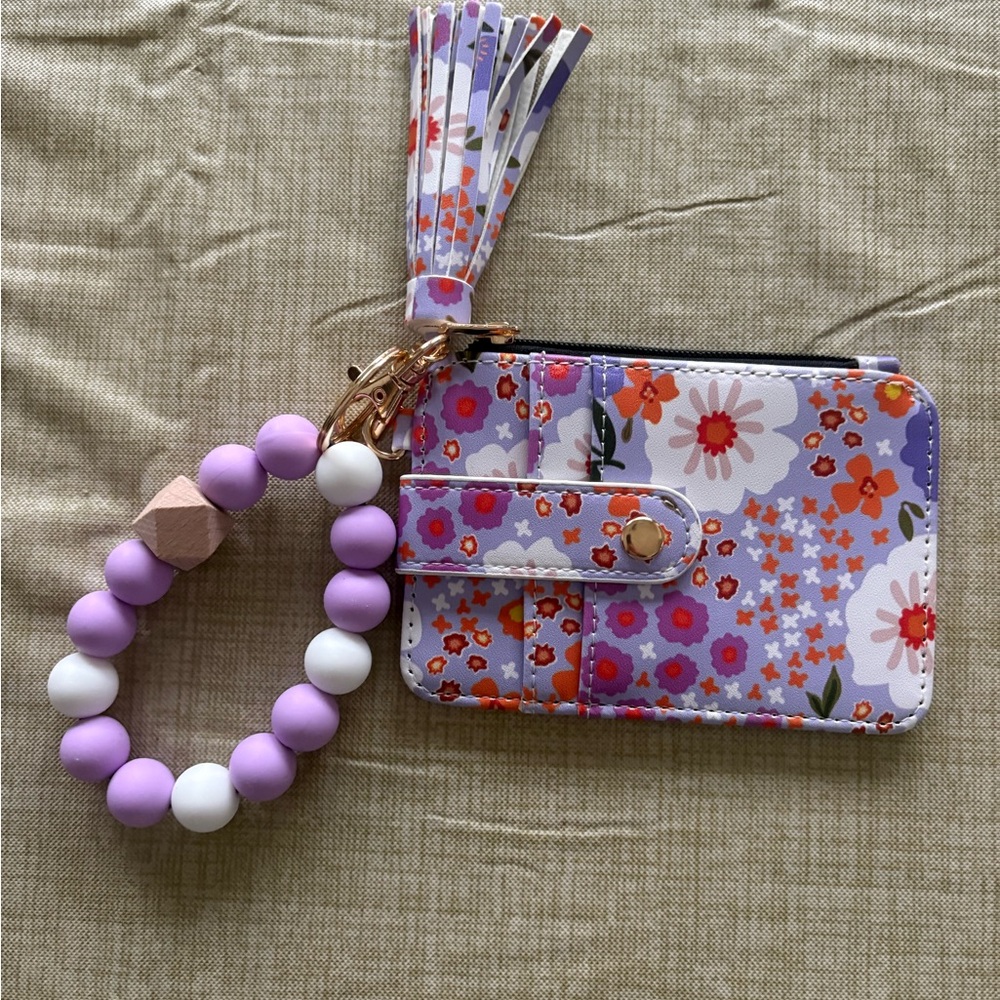 Floral beaded wallet keychain doubles as a beaded wristlet keychain card holder